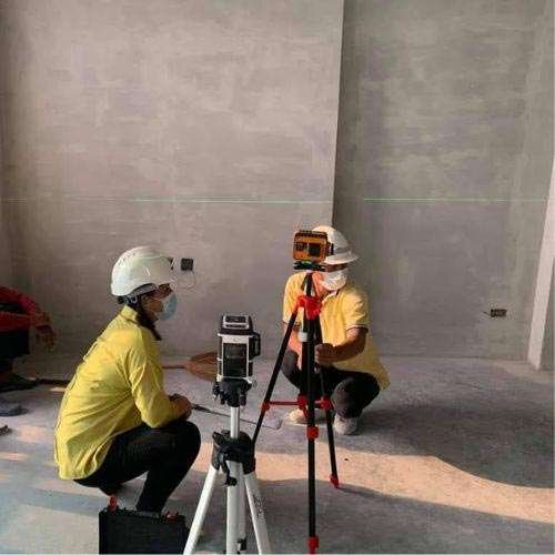 Bfloor Expertise team checking and flattening the floor for subfloor preparation.